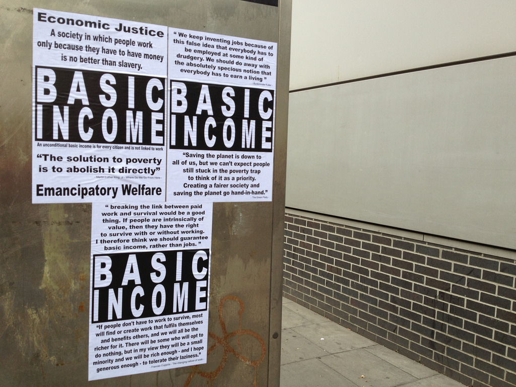 Basic income in the ‘long now’: three critical considerations for the future(s) of alternative welfare systems