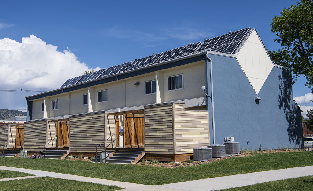 A Permanent Community Energy Cooperative model to fight climate change and wealth inequality